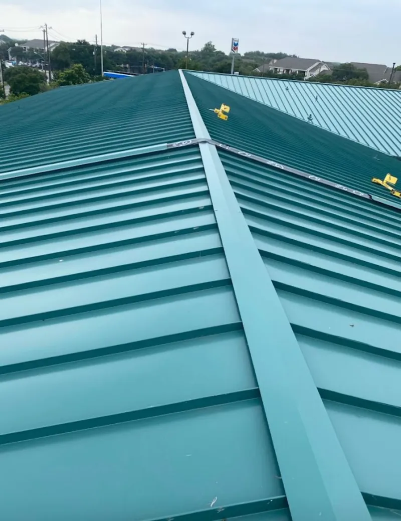 Green commercial metal roof ridge and valley for Metal Roof Repair in Webb City
