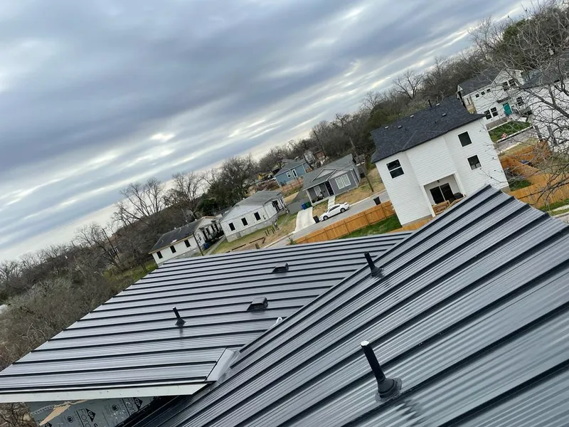 Standing seam metal roof panels with vents for Skylight Repair in Webb City